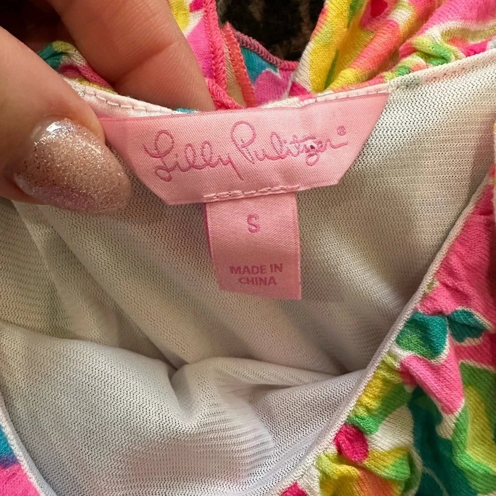 Lilly Pulitzer Vibrant Pink and Green romper.